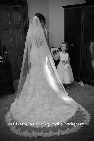 Brides gorgeous dress with bridesmaid